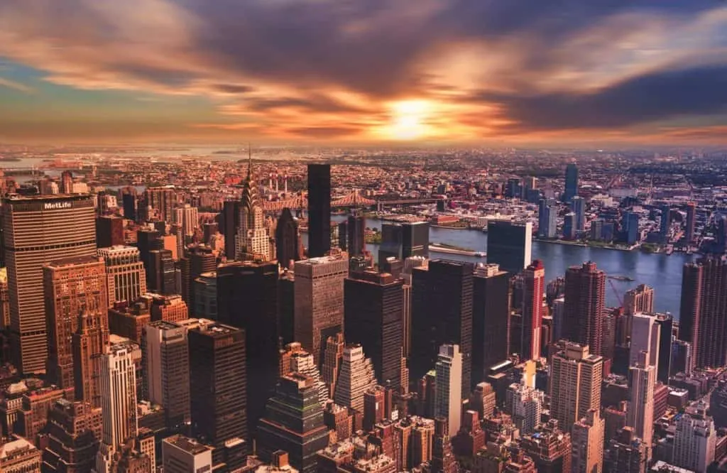 high angle view of cityscape against cloudy sky 313782