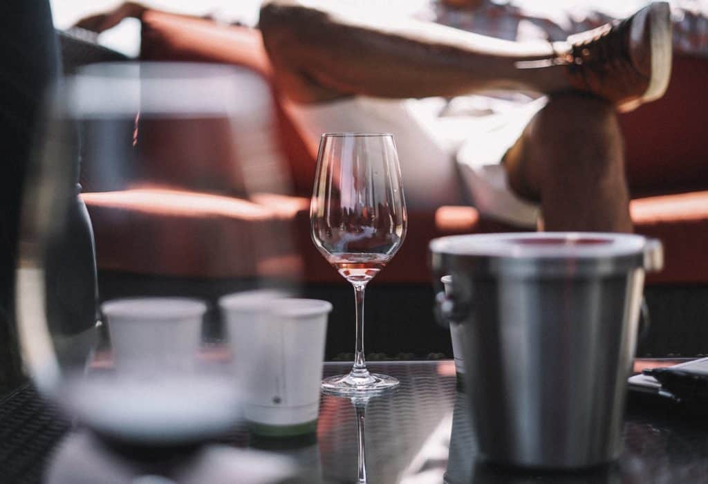 Wine glass in Napa photo by Brad Neathery via Unsplash