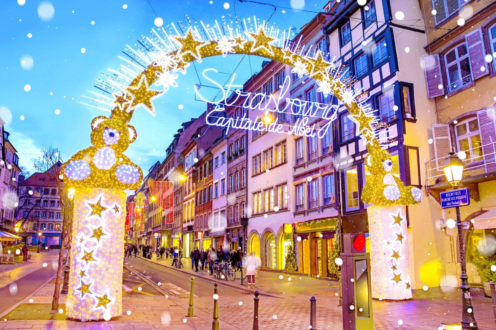 Entrance gate with illumination decorations to the Christmas Market in Strasbourg - capital of Noel, Alsace, France.